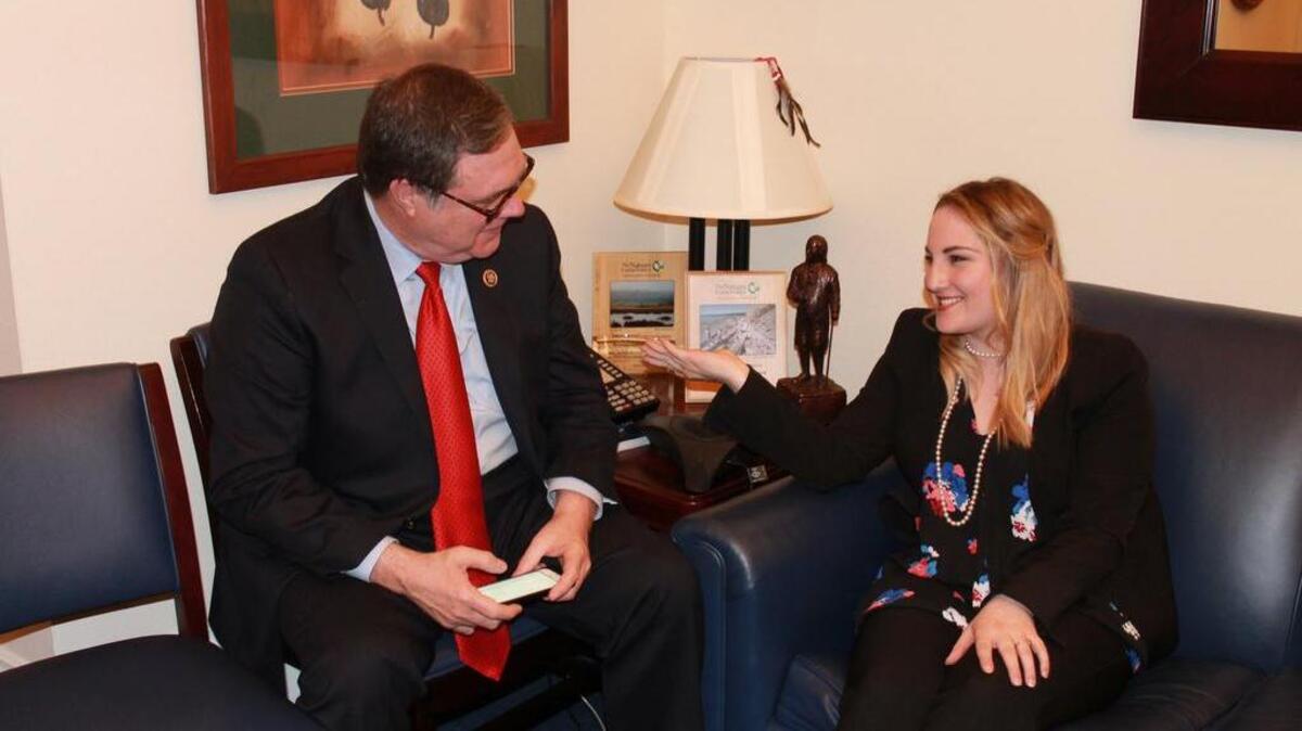 Kelty Pierce, 19, chats with U.S. Rep. Denny Heck, who represents the 10th District of Washington state.