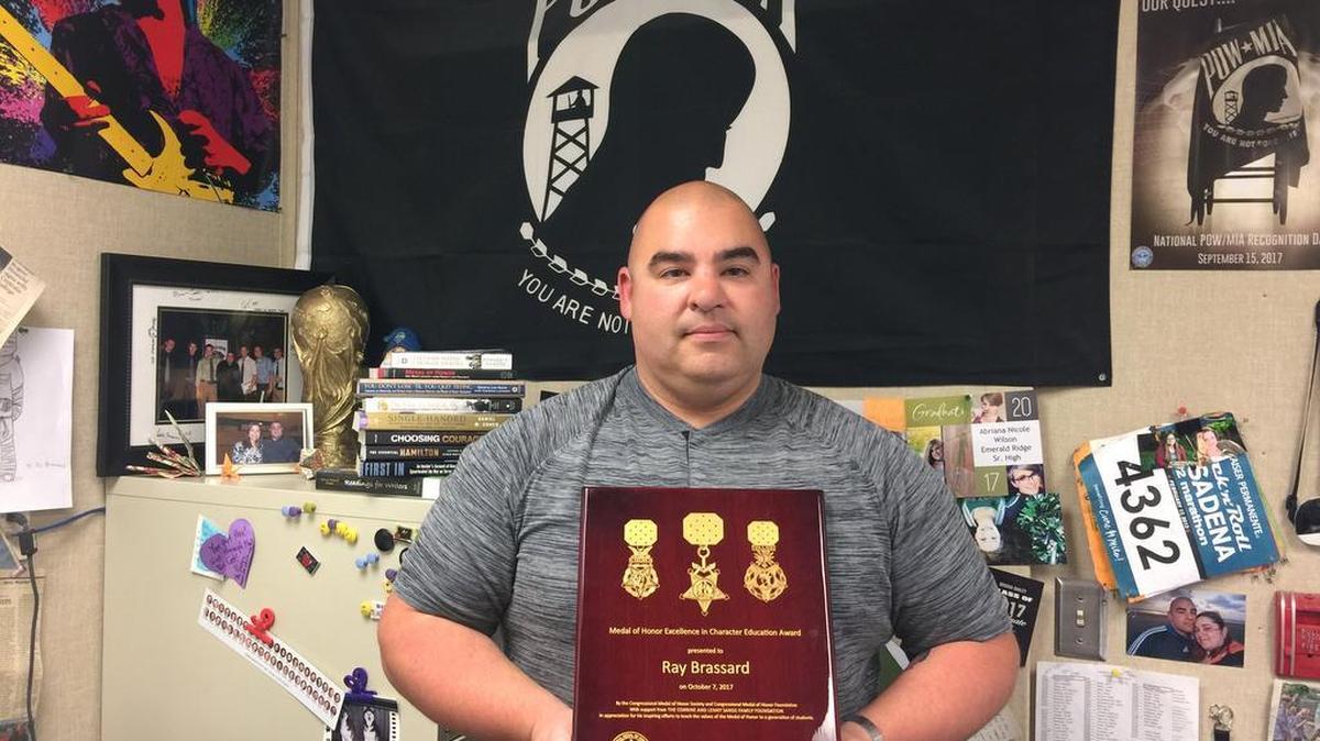 Emerald Ridge High teacher and Puyallup High School football coach Ray Brassard was awarded the first-ever Medal of Honor Excellence in Character Education award at the high school level by the Congressional Medal of Honor Foundation.