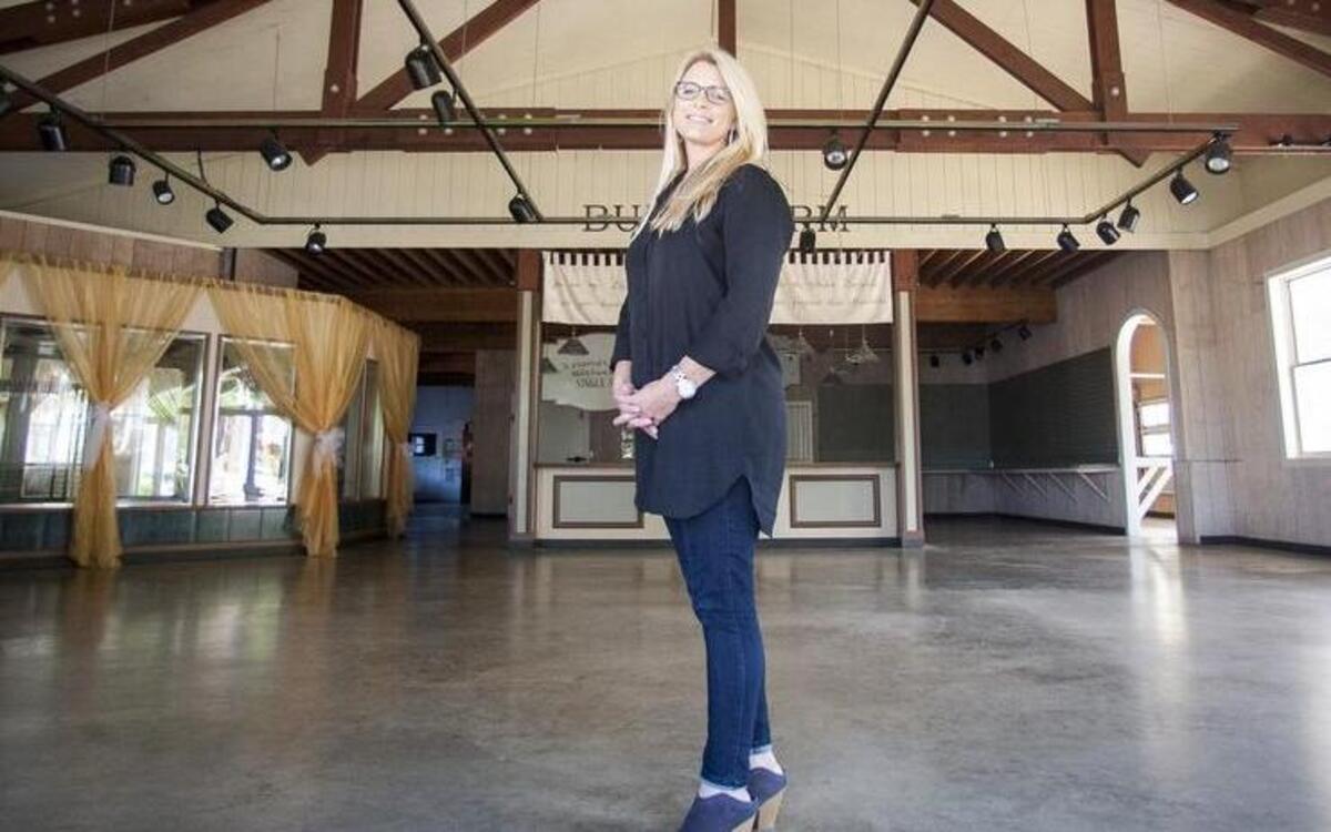 Krista Linden stands in the space of a future cafe and possible restaurant space on the former Van Lierop Bulb Farm in Puyallup. Step By Step, a nonprofit organization servicing at-risk mothers, received a $50,000 donation as the beneficiary organization for the 18th annual Absher Kids’ Cup Charity Golf Tournament.