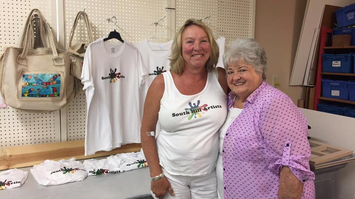 South Hill Artists president Karen Stclair and board member Myrna Hume showcase their creations at the studio in South Hill where they host their meetings.