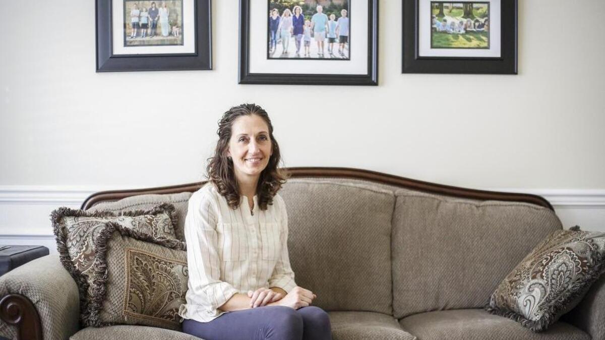 South Hill resident Robin Lowry sits for a portrait in her home. After being declared cancer-free in 2015, Lowry discovered she had cancer again in 2016. Despite this, Lowry is excited to return to work and resume her outdoor lifestyle with her family.