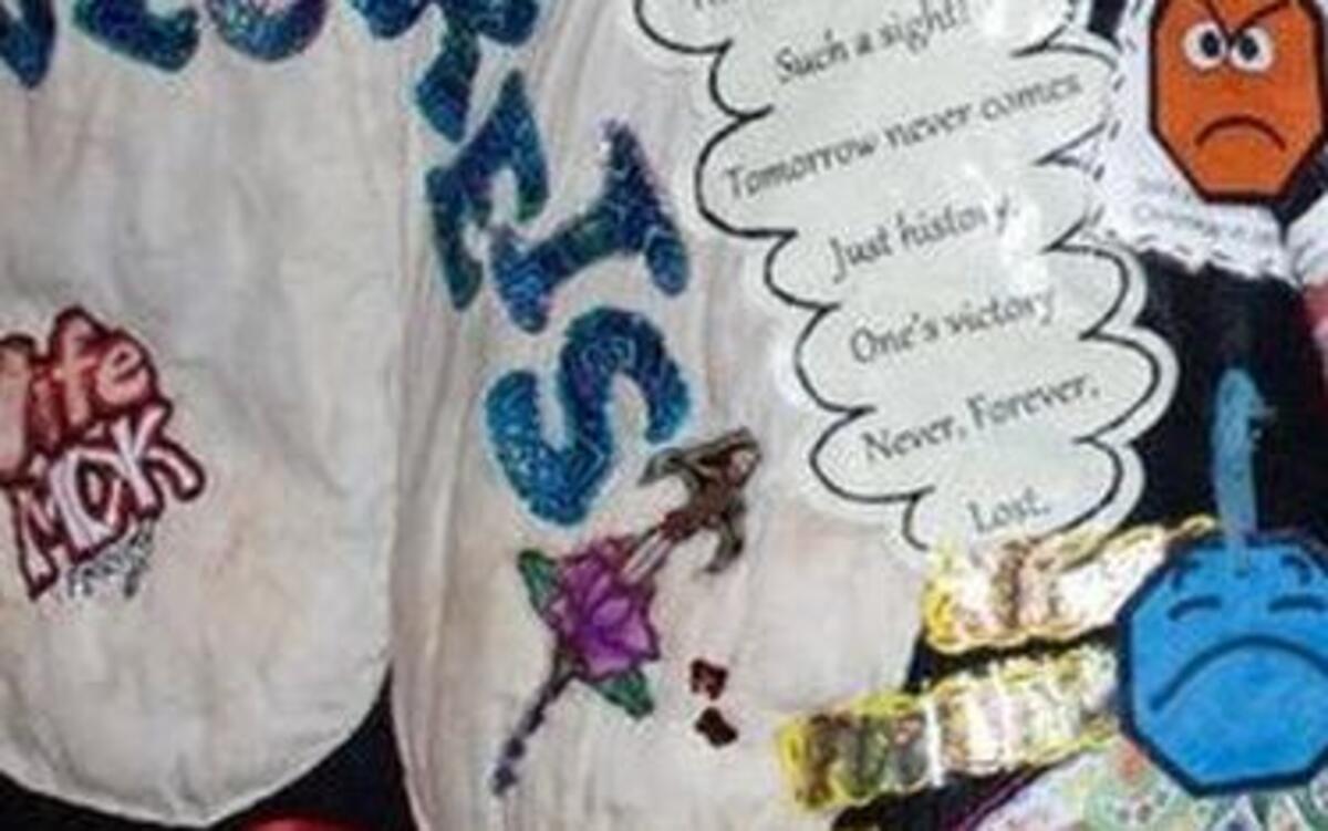 Puyallup artist Debra Kirk created her “collage coat” for the Wearable Art Show by sewing on images, words and quotes.