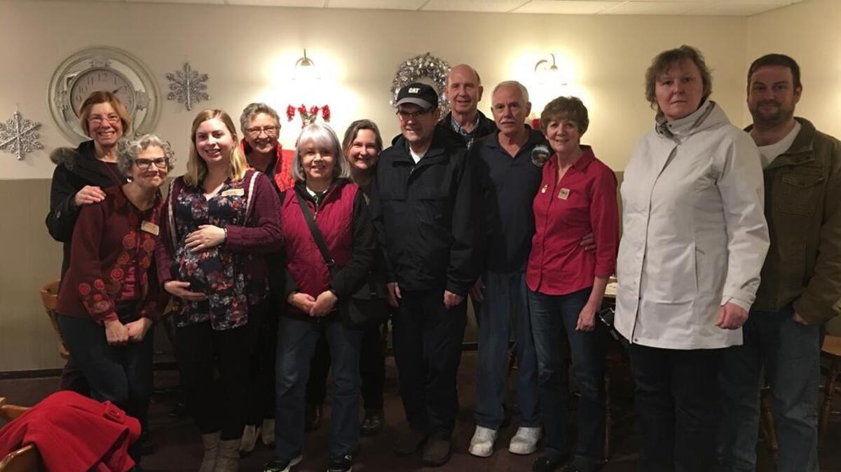 Visitors of Memory Cafe gather for a group photo at Mrs. Turner’s Restaurant in Puyallup. The cafe aims to provide socialization and support to those who struggle from memory loss diseases.