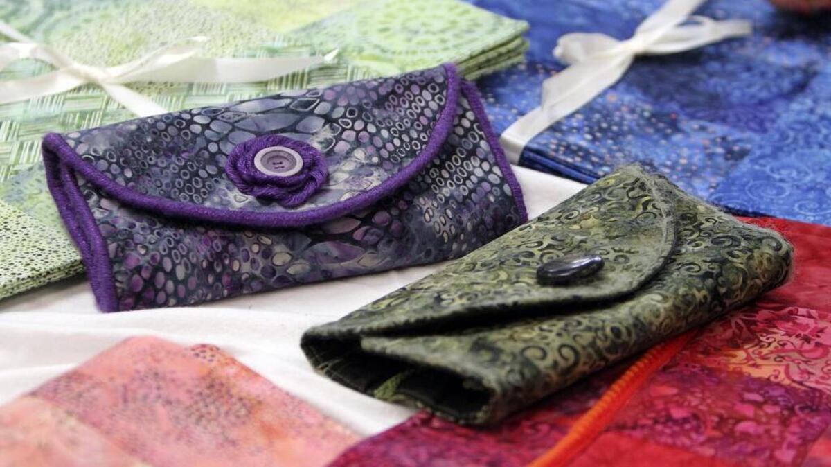 Holiday-themed jewelry bags were handcrafted by Pilgrim Lutheran Church members for the upcoming Christmas bazaar.