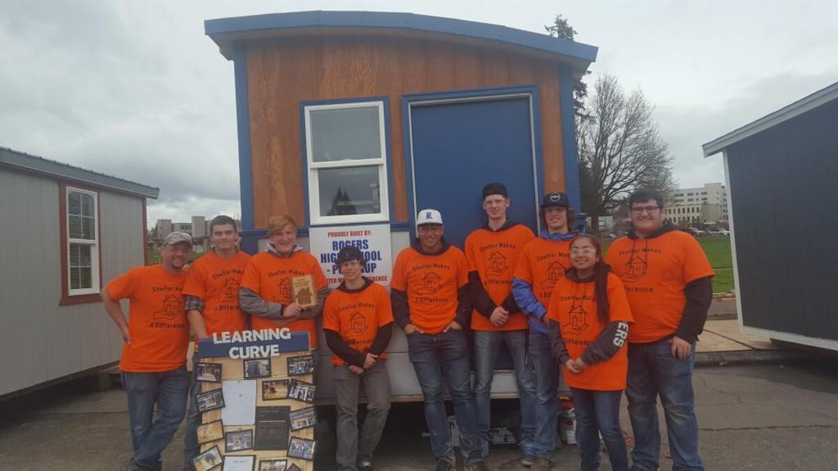 Rogers High School’s Architecture, Construction and Engineering class won first place in the Homeless Shelter Project at the 2017 CTE Showcase of Skills competition in Olympia on March 27. The tiny house was transported to Licton Springs in Seattle, where it is currently helping the homeless.