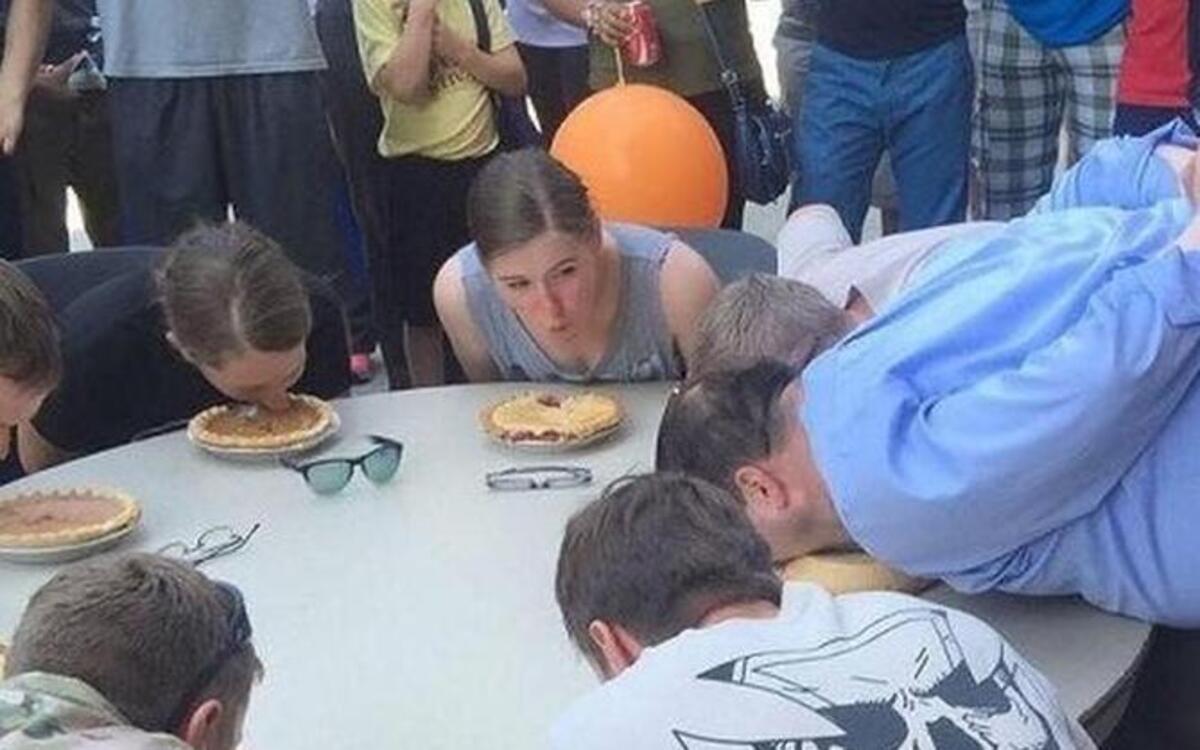 Troops and community members participate in a pie-eating contest at last year’s Salute to the Troops event in Pioneer Park. The Puyallup-Sumner subchapter of the Association of the United States Army (AUSA) hosts the event every August.