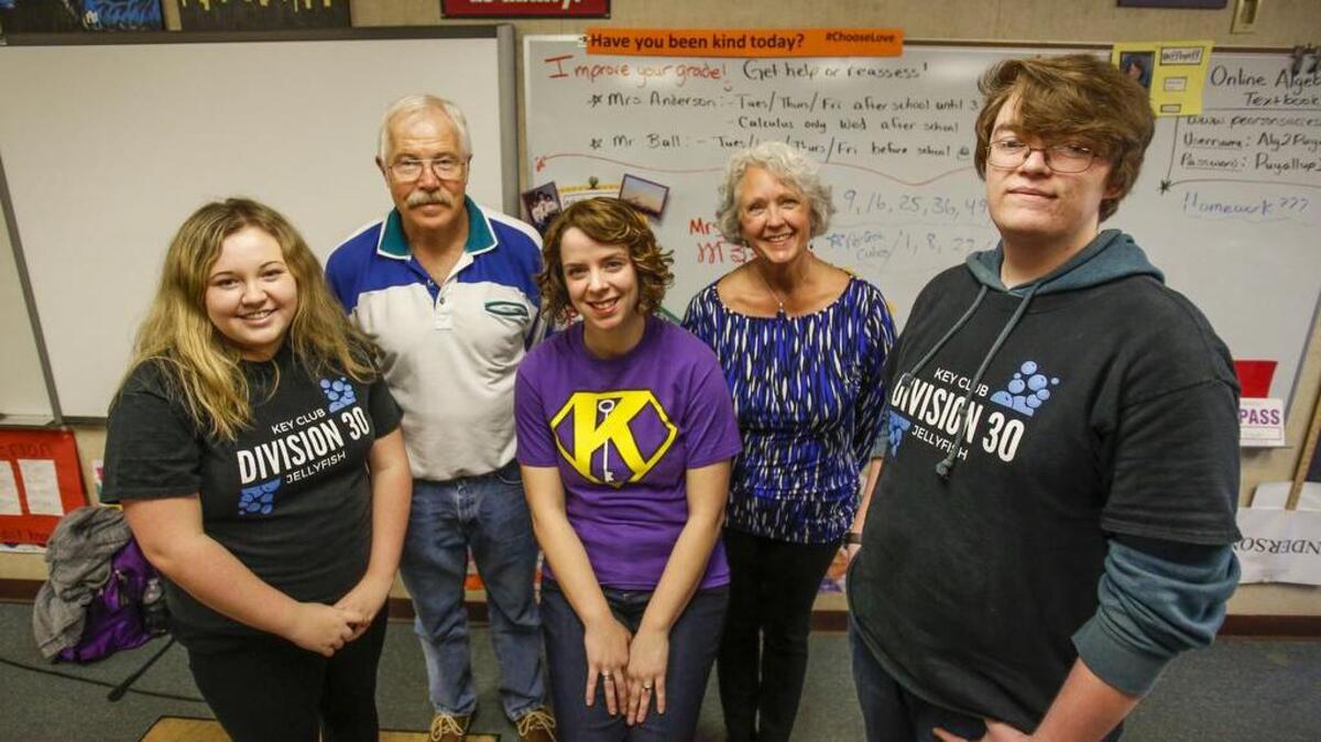Sherbert Ball planners Brooklyn Garrett, Wade Ridenour, Jessica Anderson, Doreen Ridenour and Keagen Brendle, from left, gather at Puyallup High School for a meeting about the event.