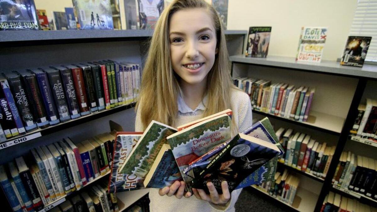 Kalles Junior High School student Rachel Dinham is the force behind collecting books to benefit children who may not have the means to buy their own books. The teen, who started the Turn a Page organization, has received more than 2,500 books from donors that are then given to the St. Francis House and Helping Hands House for final distribution.