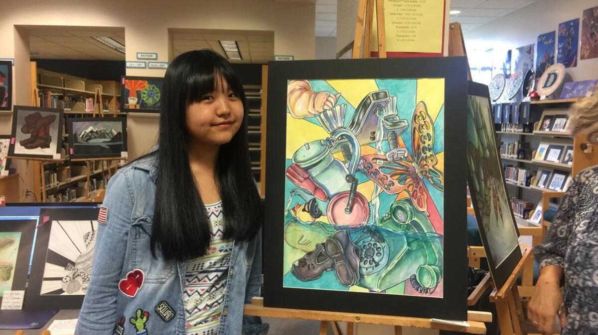 Rogers High School sophomore Yui Hirata’s oil pastel painting of a natural landscape won her the 2-D Superintendent’s Award at the 2017 Vesey-Munson Art Show on May 24. It was the second time Hirata had ever used oil pastels.