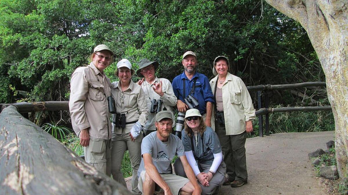 Puyallup resident Ed Pullen top left, and his wife, Kay, gather for a picture with participants of a recent bird watching trip to Kenya. Pullen will host a free birding trip at 8 a.m. Saturday (Jan. 7) at Bradley Lake Park.