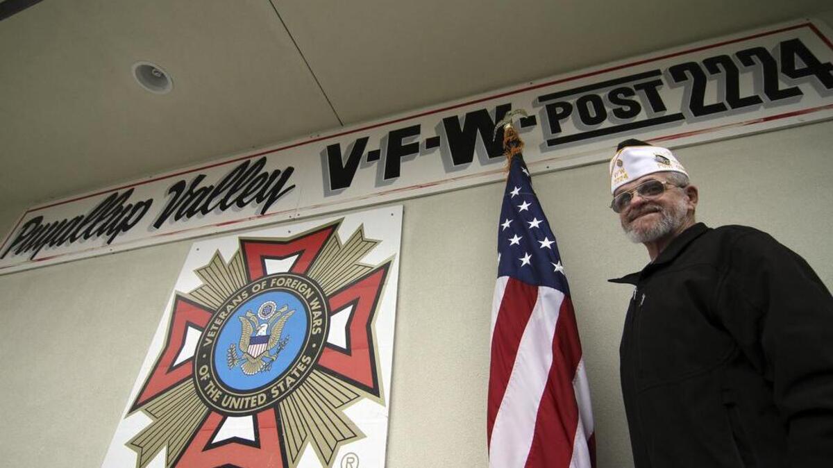 Don Long, a former Puyallup Valley VFW Post 2224 commander and current Canteen manager, stands in front of the organization’s downtown Puyallup building last week. Long and his fellow members are behind an effort to attract younger veterans to the organization.