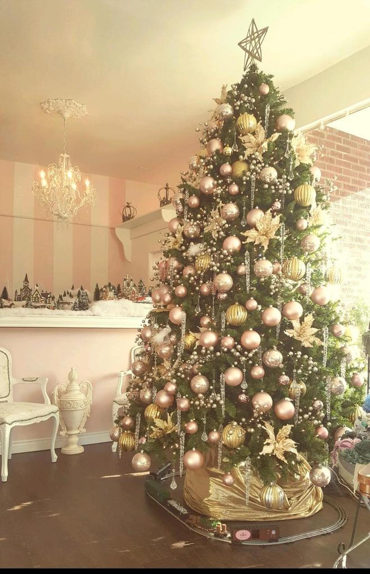 An elaborately decorated Christmas tree lights up the center of The Pink Chandelier in Puyallup.