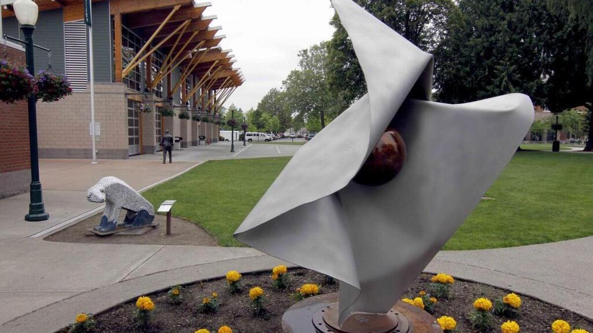 Art sculptures in Pioneer Park are part of Arts Downtown’s visible presence in the city of Puyallup.