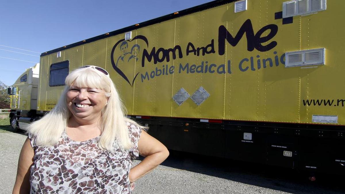 
Patricia Hooker, a board member and the treasurer of the Mom and Me Mobile Clinic, shows off the 18-wheel clinic. Once the converted semi is ready to go, the group will provide healthcare services to those in need.
