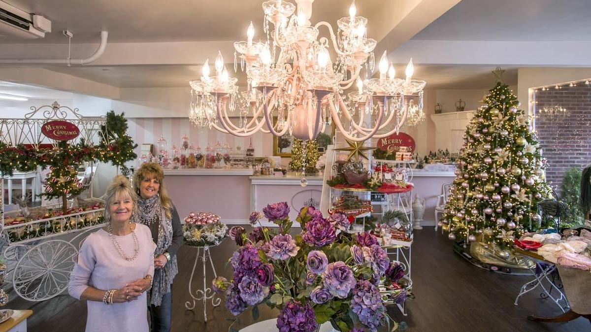 Mary Worthington, left, is manager and Letha Grapenthin is the founder/owner of The Pink Chandelier, a home decor and gift shop in downtown Puyallup. Grapenthin points out that the shop is wheelchair accessible and stroller friendly.