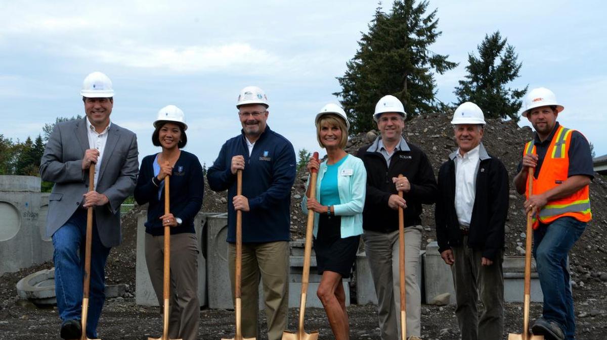 The Shaw Road Elementary groundbreaking ceremony included, from left: Michael Keaton, school board director; Kathy Yang, school board director; Tim Yeomans, superintendent; Michelle Cruckshank, Shaw Road principal; Jim Wolch, BCRA project manager; Bob Katica, BCRA principal architect and Andrew Tice, Neeser Construction superintendent.