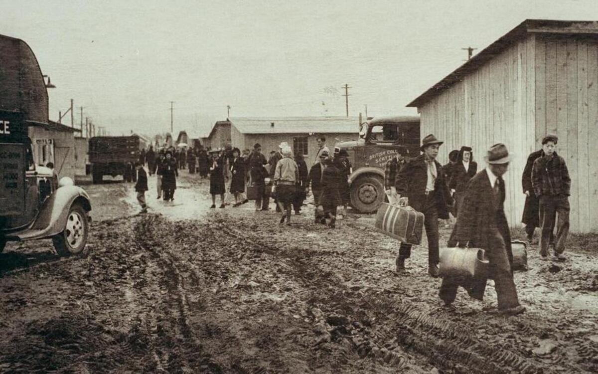 
A historic photo shows Japanese Americans interned at Camp Harmony at the Puyallup Fairgrounds in 1942. 
