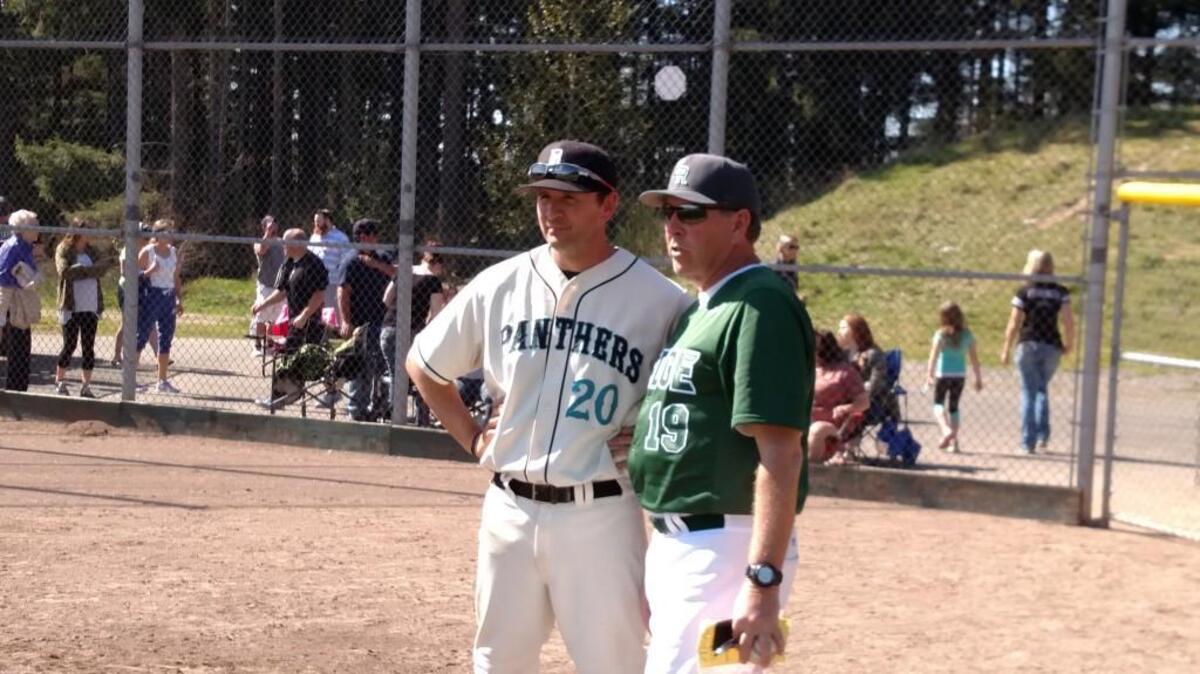 Bonney Lake High coach Mike Olson, left, and Emerald Ridge coach Larry Marshall have nurtured a relationship that started with Pacific Lutheran University baseball 20 years ago to their Panther-Jaguar relationship today.