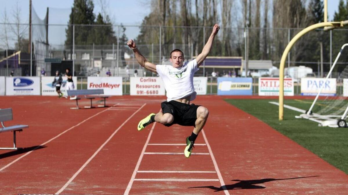 Sumner High School’s Josh Riley practices the long jump at Sunset Chevrolet Stadium last week.