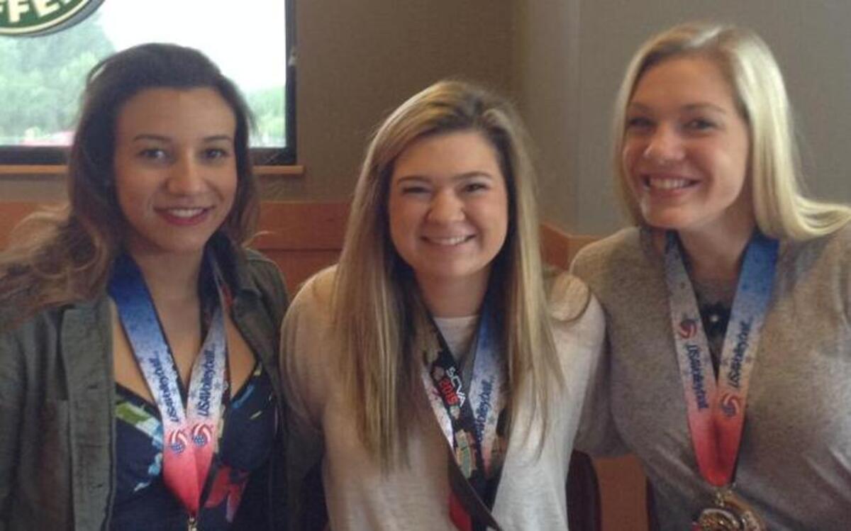 
Lexi Brown, Allie Bauer and Heather Thompson, from left, along with their Lake Tapps Volleyball Club won the USA National Volleyball Championships in New Orleans.
