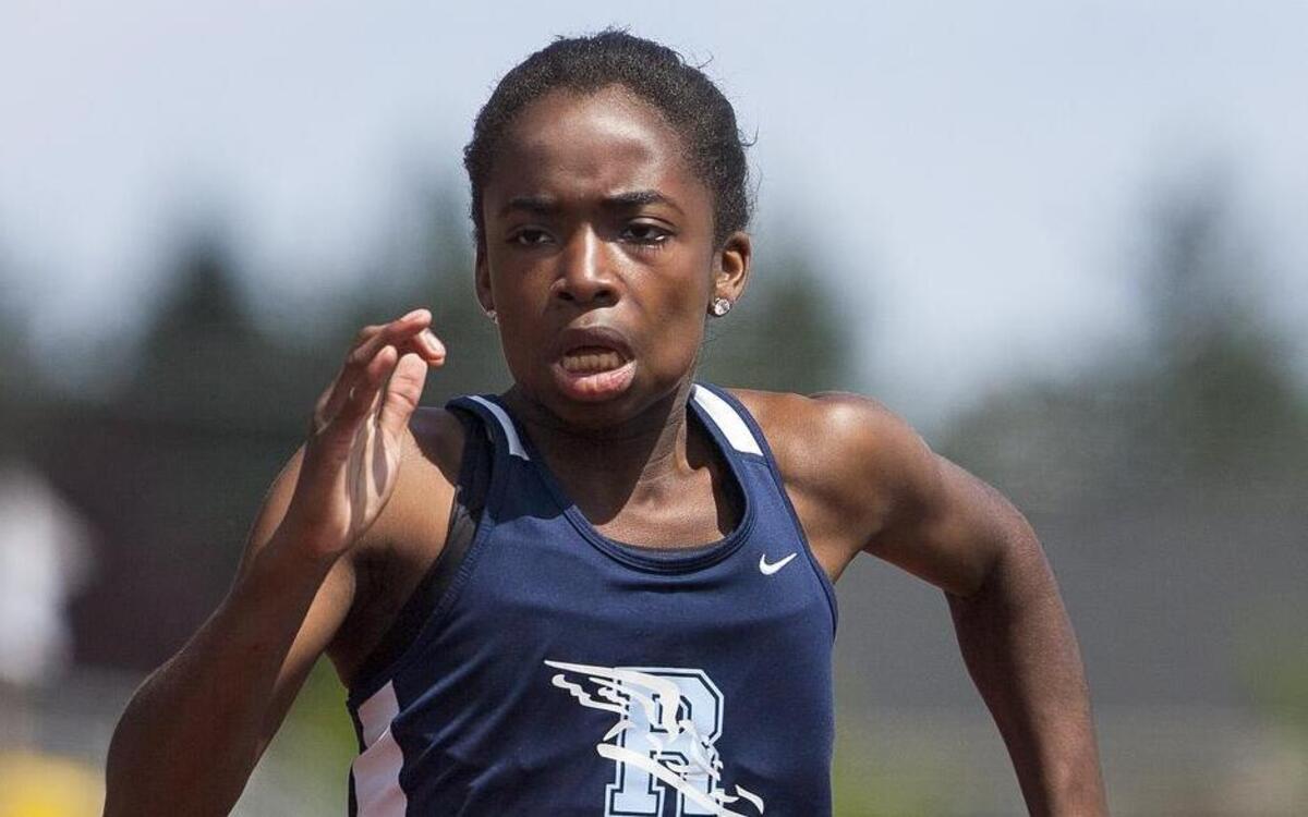 Rogers High’s Jelani Heath races in the 4A girls 100-meter dash event at Star Track XXXIV at Mount Tahoma High School on Friday, May 27.