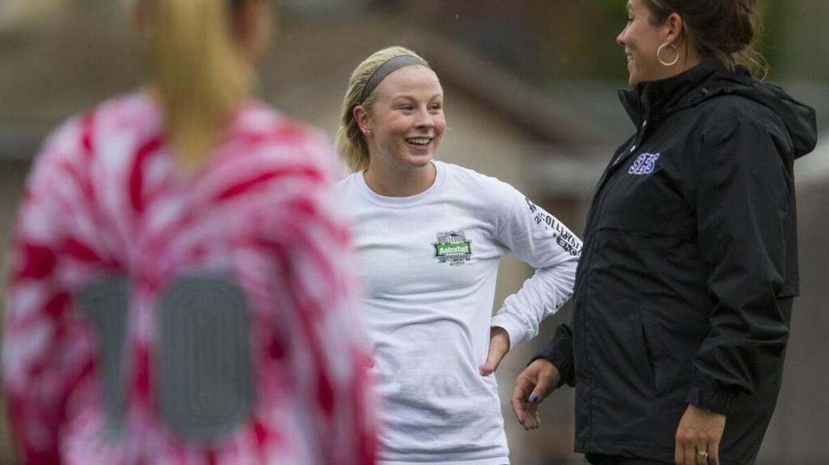 Sumner High senior Jordan Thompson talks with coach Robi Turley during practice. “When your best player is someone like Jordan, (who) has the best character and is the hardest-working player, it’s easy for people to follow,” the coach said of her star player.