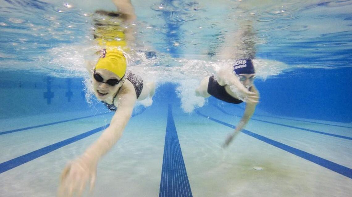 Swimming solo isn’t their style: Hert and Hill choose Rams relays over individual events
