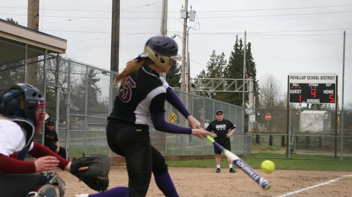 Puyallup High sophomore Sophia Bjerk blasts a leadoff home run Saturday against Prairie, breaking her recent cold streak at the plate. The Vikings hope that Bjerk’s outpouring will help carry Puyallup to its third consecutive SPSL South title.