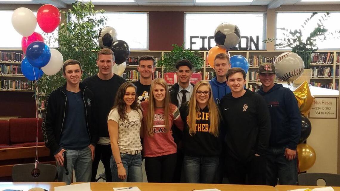 Large contingent of Puyallup High athletes sign college commitments