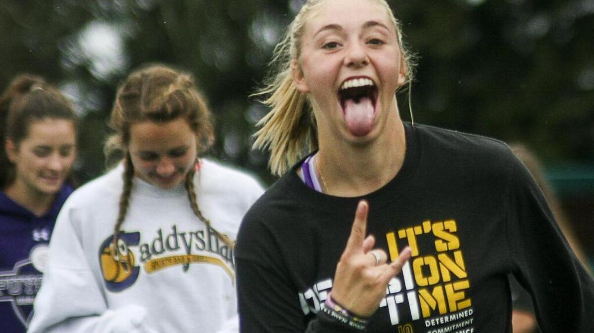 It’s all smiles for Puyallup High’s Hannah McCann, right, last week at practice as the Vikings are off to a 2-0-1 start this year.