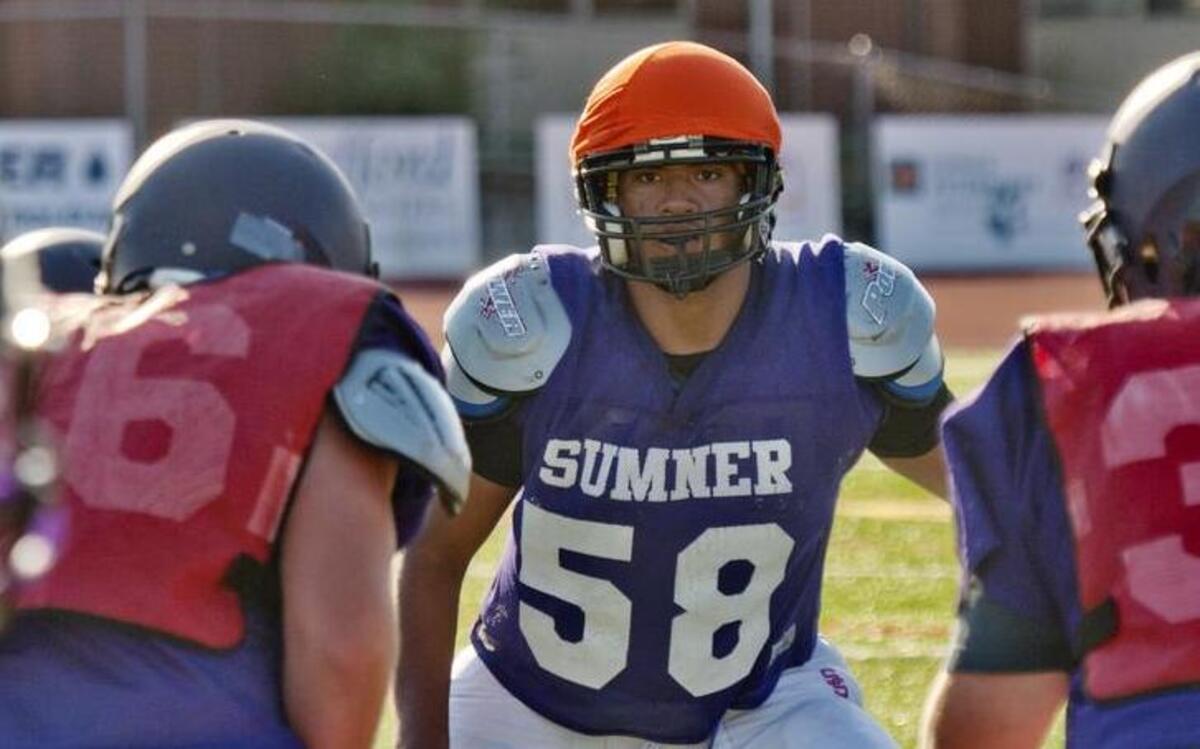 
Then-Sumner High linebacker Austin Striplin lines up at a practice at the high school. The former Spartan now plays center at Pacific Lutheran University. 
