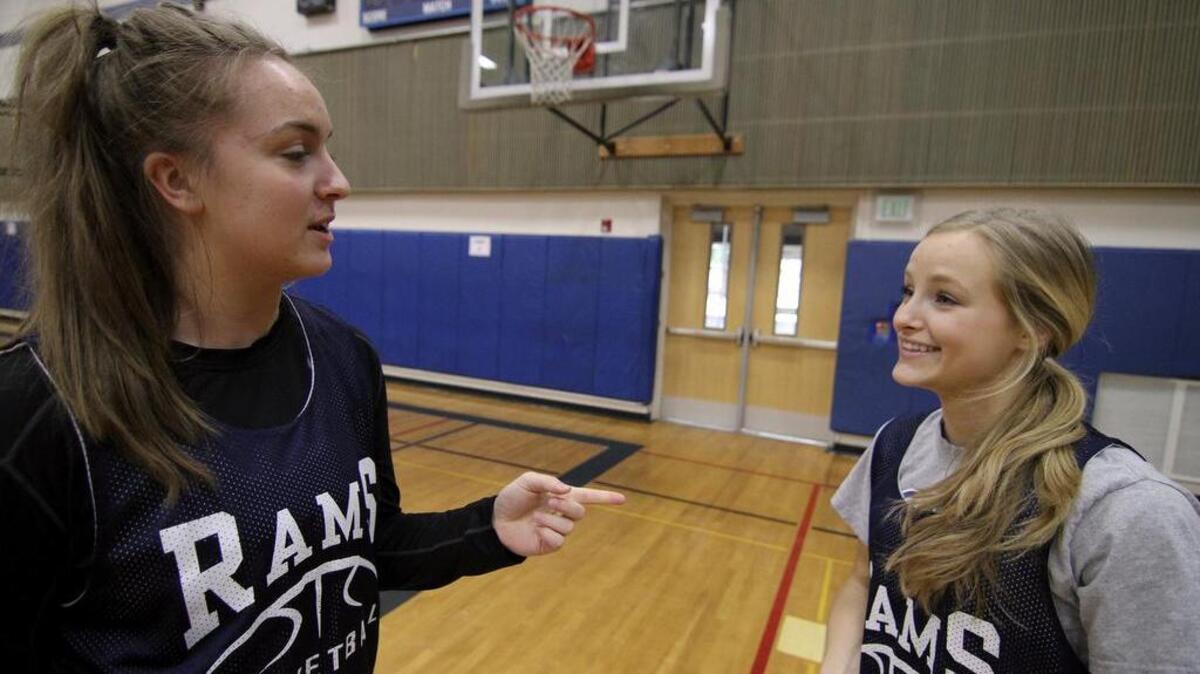Rogers High girls basketball players Jessi Westering, left, and Tristan Coltom were named to the All-SPSL South first team this season. Westering led the 4A SPSL in scoring. The duo was also instrumental in helping the Rams clinch a West Central District berth after starting the season 1-5.