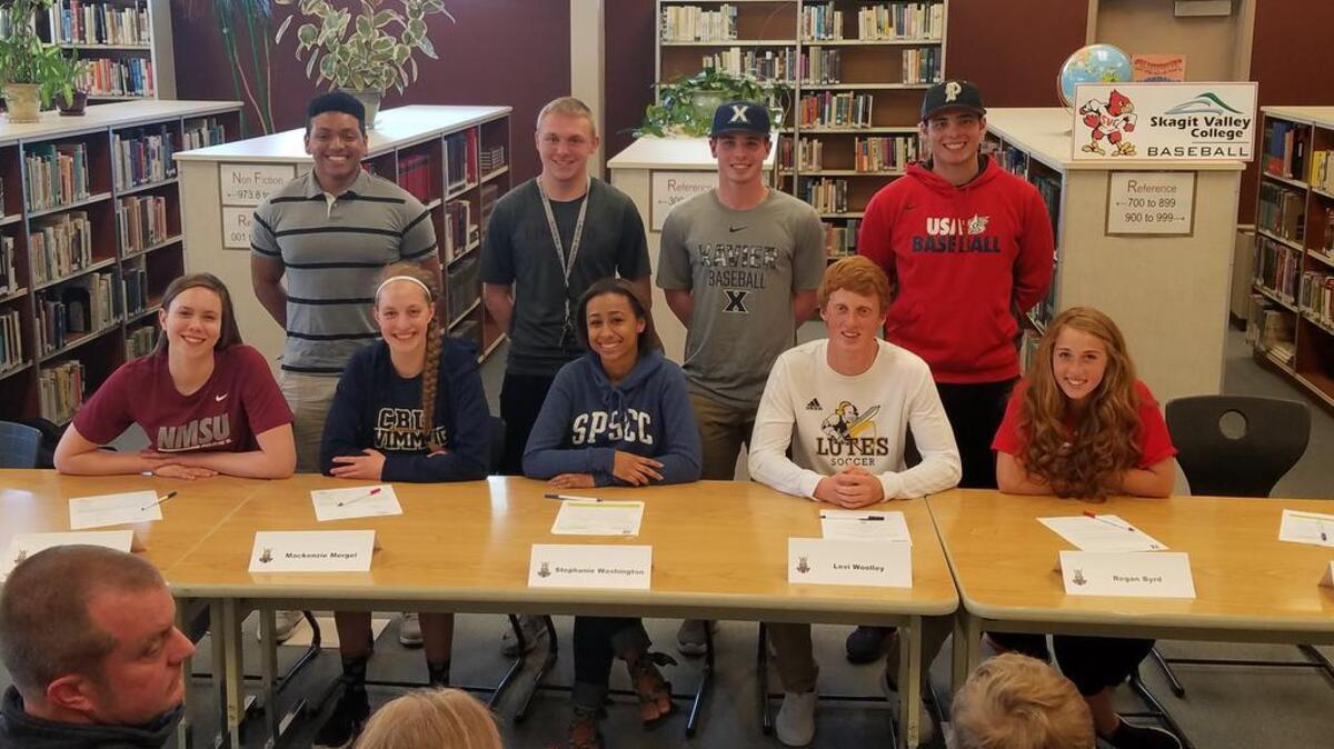 The group of Puyallup High athletes signing letters included (back row, from left) Maceo Thomas-Murphy, Tyler Torgerson, Riley Pletcher, Steven Parker Jr. Bottom row: Lindsey Muiznieks, Mackenzie Mergel, Stephanie Washington, Levi Woolley and Regan Byrd.