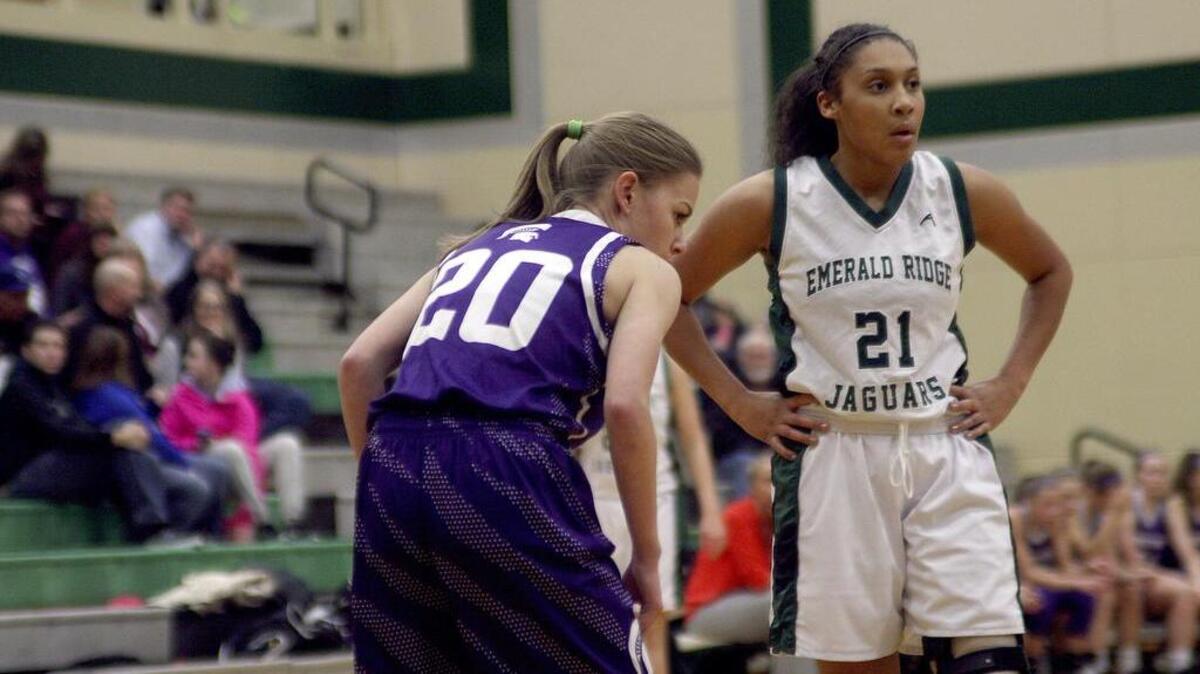 After an ACL tear took a year of basketball from Ayae Douglas (21), the senior is now back on track, starting for the Emerald Ridge girls basketball team.