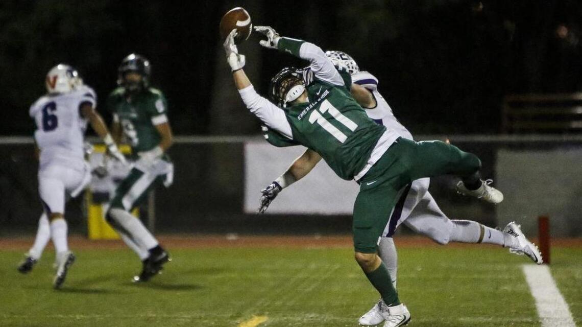 Sumner escapes ER, 49-42, in OT, captures 3rd undefeated season in 4 years