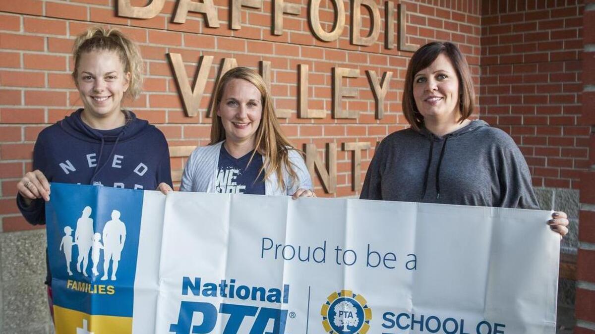 Daffodil Valley Elementary was recognized as a National PTA School of Excellence by the National PTA last August. Photographed with the banner are, from left, Heather Gadd, current vice president of Daffodil Valley PTA, Effie Garcia, president, and Tiffany Marlow, former vice president.