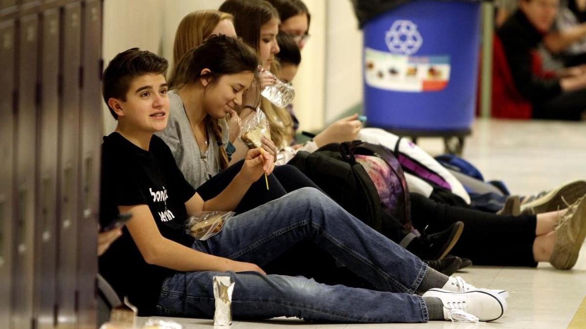 Sumner High school students line the adjoining hallways during a lunch break at the crowded school on Jan. 12.