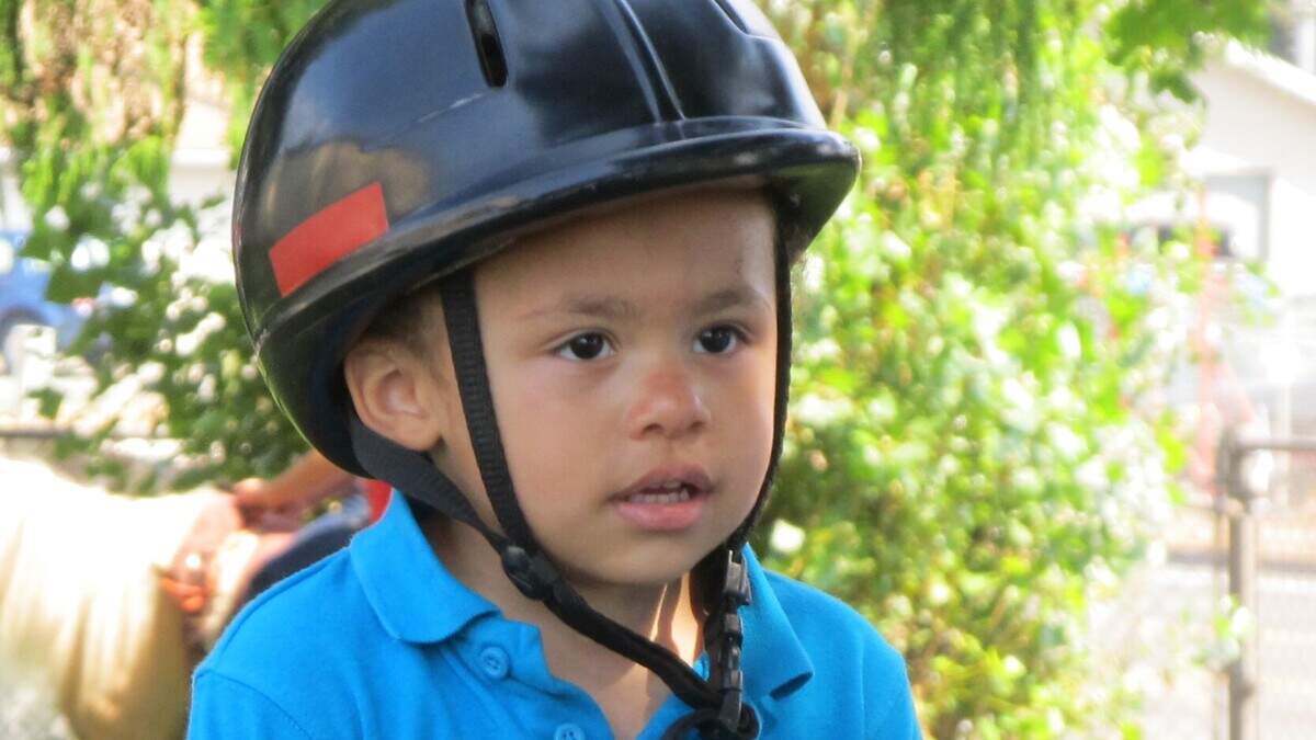 A boy rides a pony at the 2015 Carnival Extravaganza hosted by A Step Ahead, a nonprofit organization that provides services for children who have one or more developmental disabilities or delays.