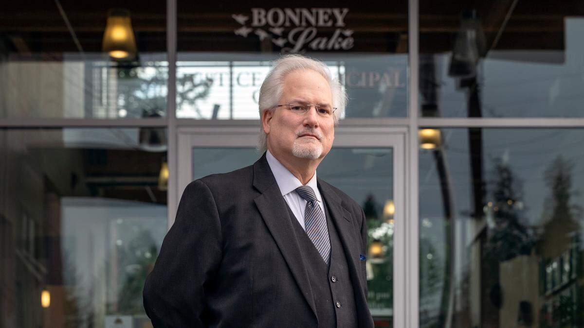 Michael McCullough poses for a portrait outside of the Bonney Lake Justice and Municipal Center in 2021.