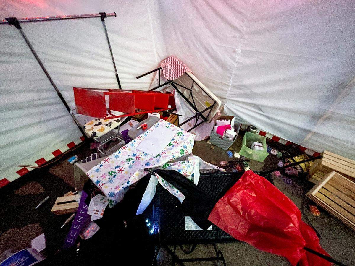 Items are strewn across the floor after someone vandalized the Red Barn Market and Nursery on Tuesday, Dec. 7, near Puyallup.