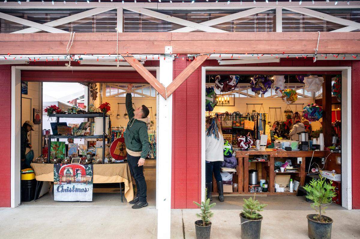 Red Barn Market owner Dennis Kupchenko opens the doors for holiday shopping in 2021. This year, the store is hosting special holiday activities every Friday-Sunday through Dec. 18.