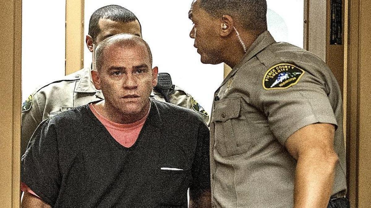 Tracy Worwood of Tacoma is lead into court Thursday during his arraignment on charges of unlawful possession of an explosive device and reckless endangerment. Worwood was released on his own recognizance.