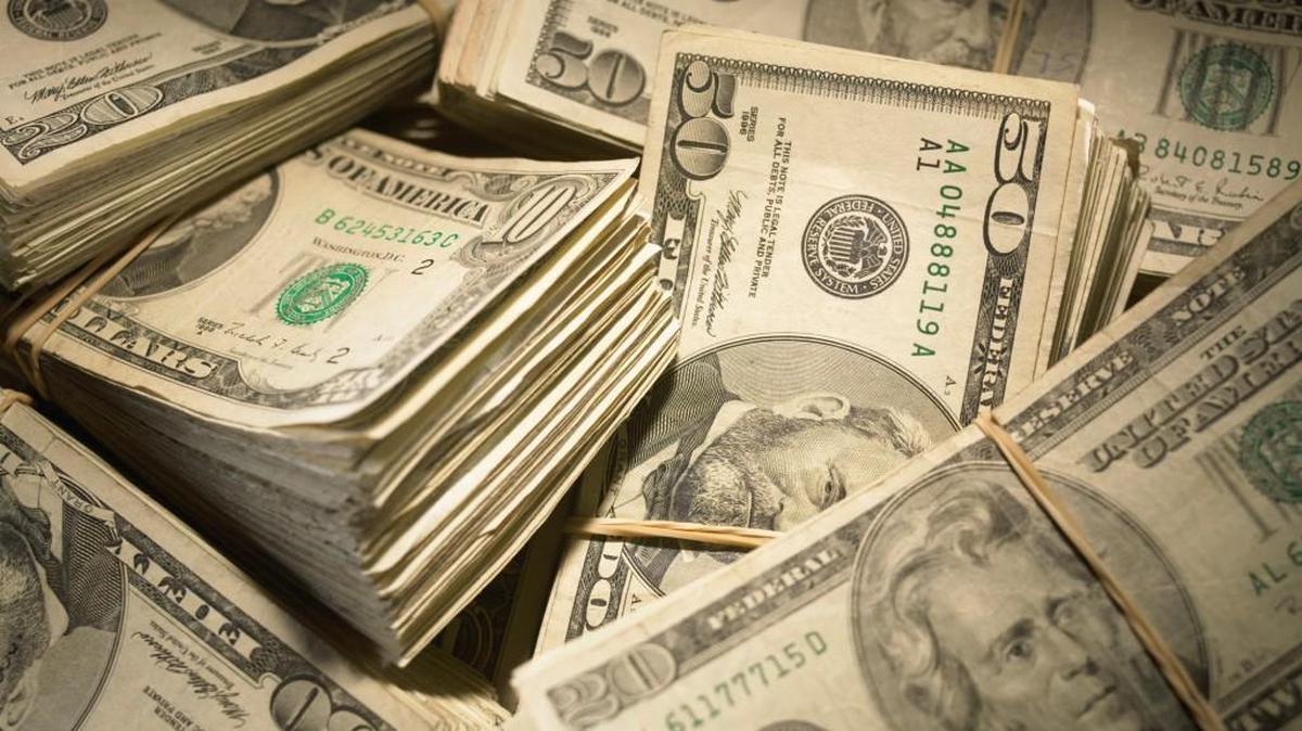 Two Tacoma store owners were charged Friday with registering more than $200,000 in fraudulent food stamp transactions over an 18-month period.