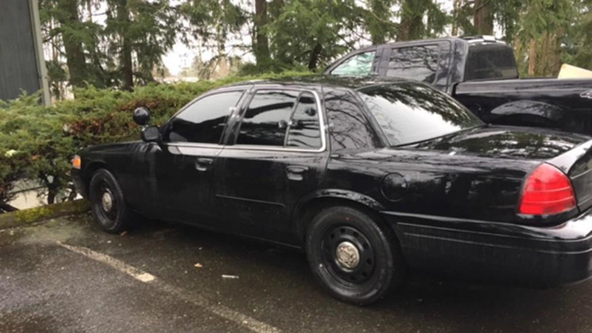 This black Ford Crown Victoria was used by a Lakewood security guard who was impersonating a police officer in Seattle, according to King County Superior Court charging documents.