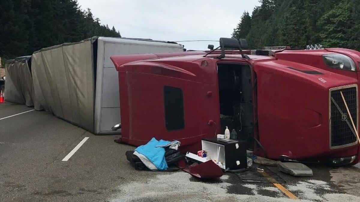 A Tacoma semitruck driver was arrested Tuesday night by Oregon State Police after troopers say he was high on methamphetamine when he rolled his rig on Interstate 5 south of Roseburg.