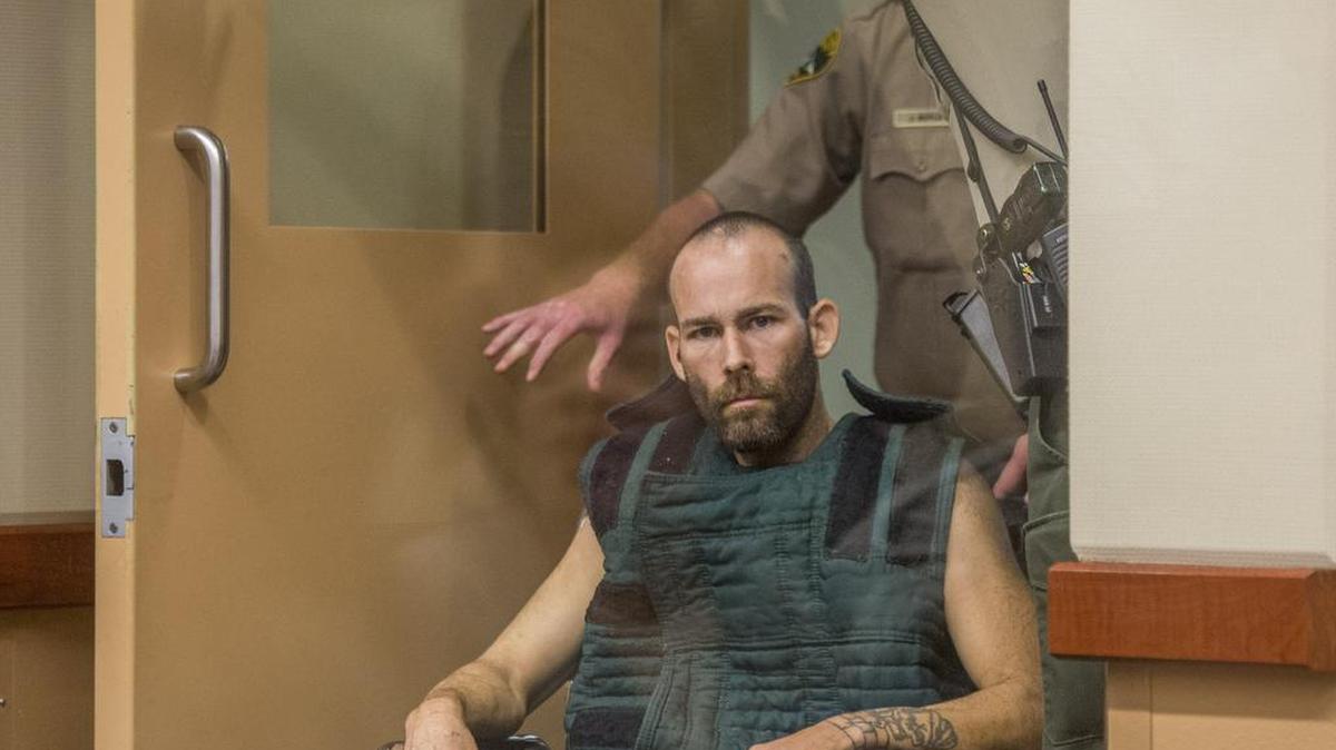 
Nathen Terault is wheeled into Pierce County Superior Court on Monday. He was arraigned on numerous charges for a shooting spree in Puyallup, including the death of Richard Johnson.
