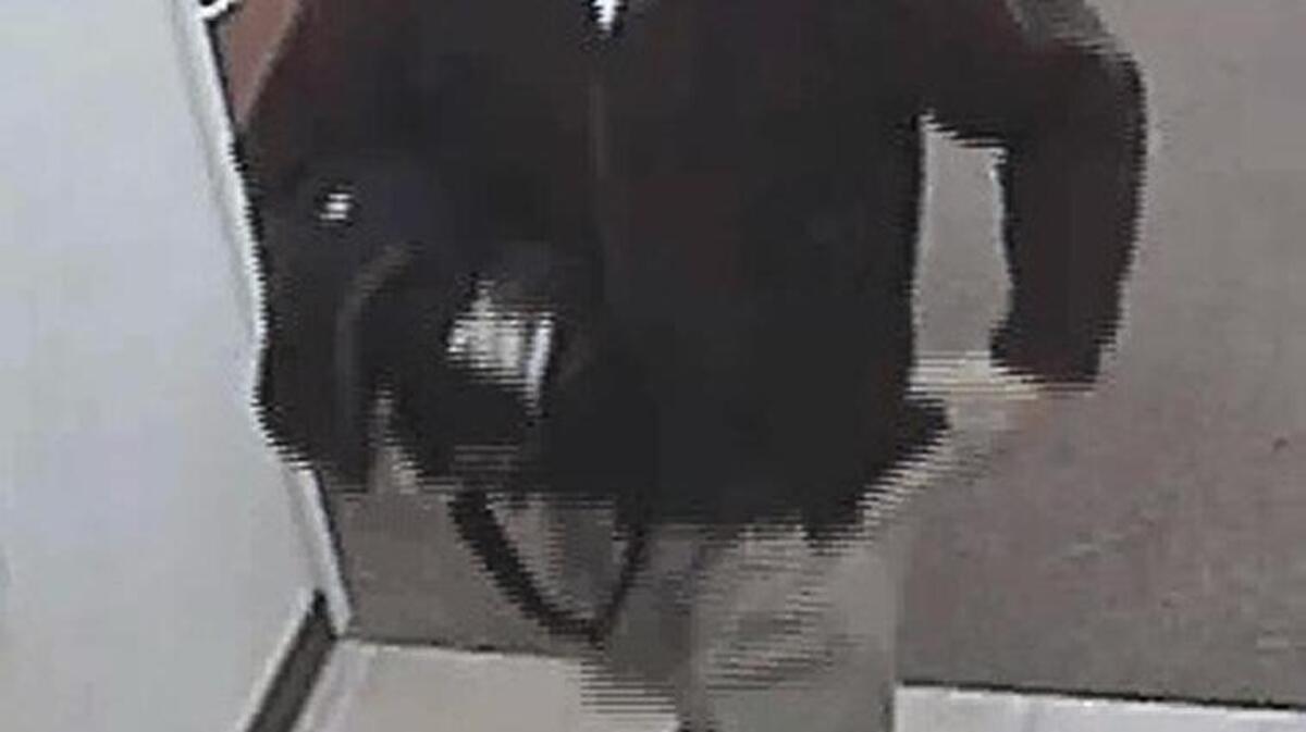 The man who robbed Banner Bank in the 13600 block of Meridian Avenue East at about 5 p.m. walked behind the counter and demanded cash from the tellers. He was described as 6 feet and 230 pounds, wearing a green coat, khaki pants, brown shoes, latex gloves and the mask.