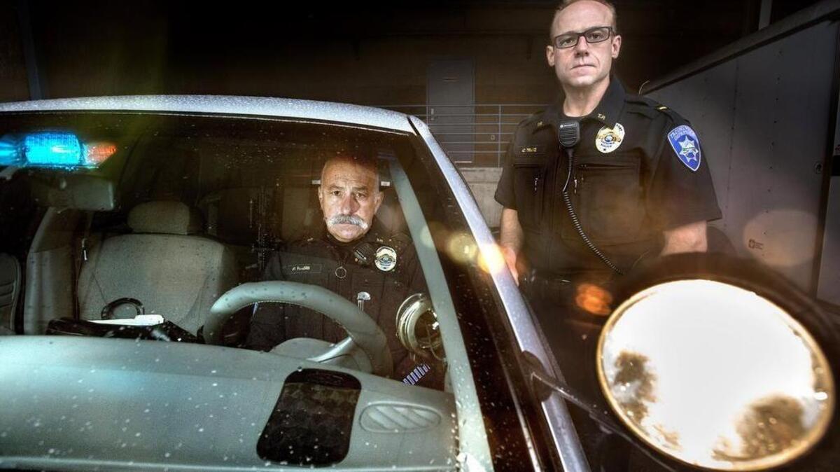 Sgt. Pete Habib, left, and Lt. Chris Travis head up Tacoma Police Department’s Violent Crimes Reduction Team, which was created in December in response to a spike in drive-by shootings. The team pulls personnel from patrol, special investigations and criminal investigations, and focuses on arresting known violent offenders.
