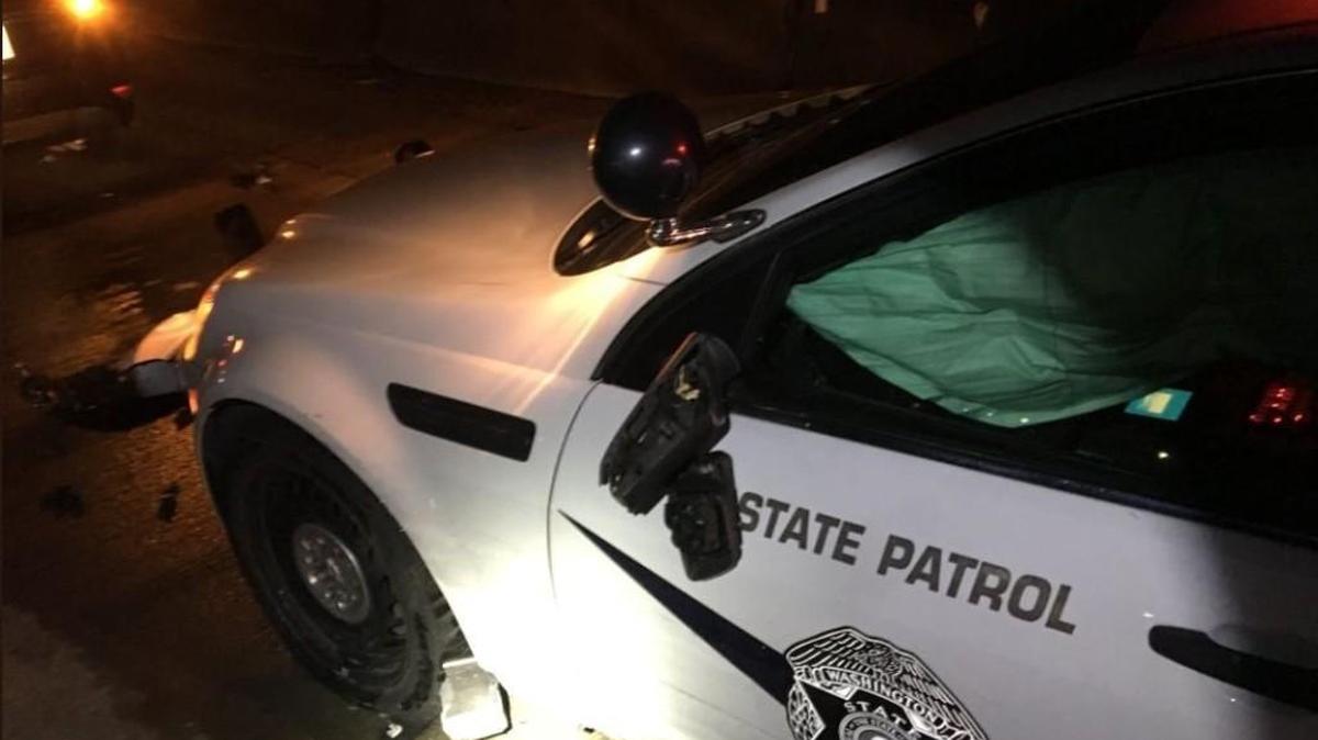 A Washington State Patrol vehicle was hit by a car during a traffic stop in 2018, causing the airbag to deploy in the trooper’s vehicle.