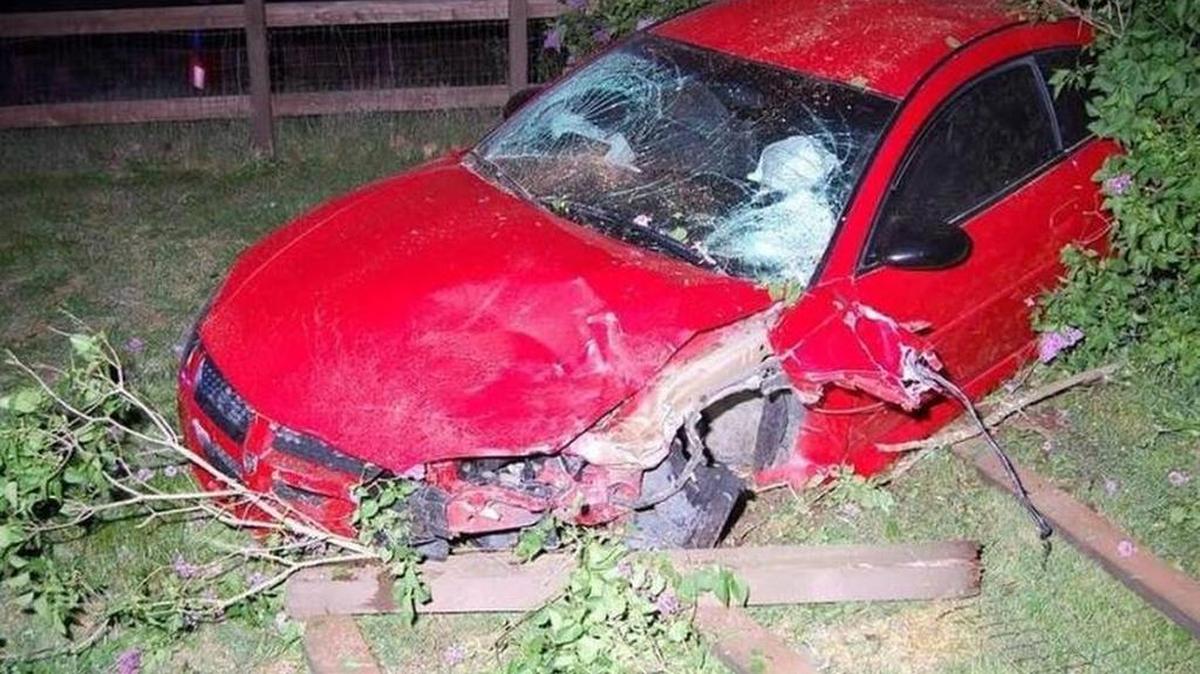 Police say the 16-year-old driver of this 2004 Dodge Stratus was street racing April 19 when he lost control and hit a motorcyclist before skidded 103 feet and going through a yard before crashing into a fence. The motorcyclist died April 21.